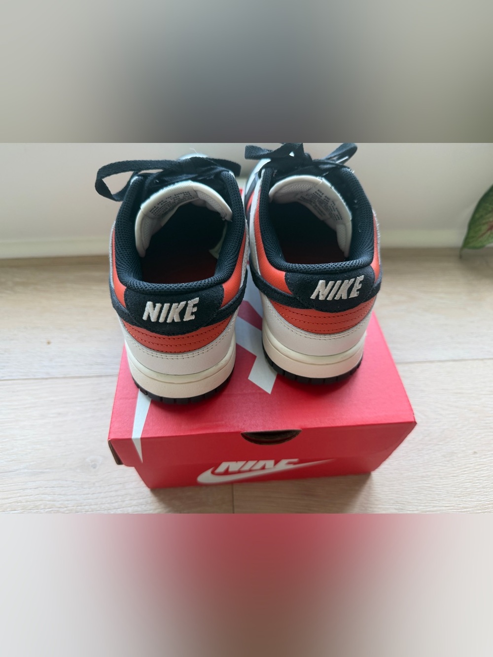 Nike Dunk Low Retro Sneakers in White/Black/Orange - Picture 2 of 5